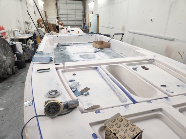 Liner and Hatch Plug Construction